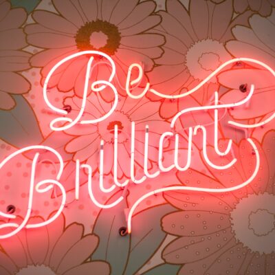 Light up sign saying Be Brilliant